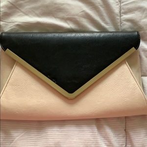 Cream and black clutch